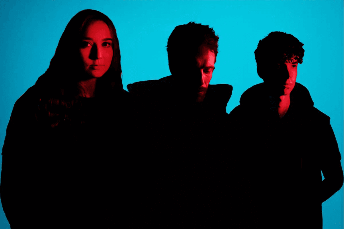 Band promotional portrait with blue and red lighting